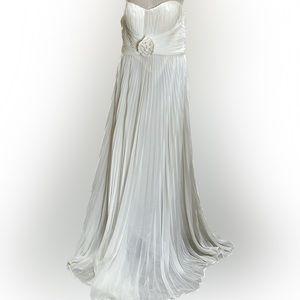 White long pleated dress with rose detail